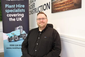 James sitting in an office