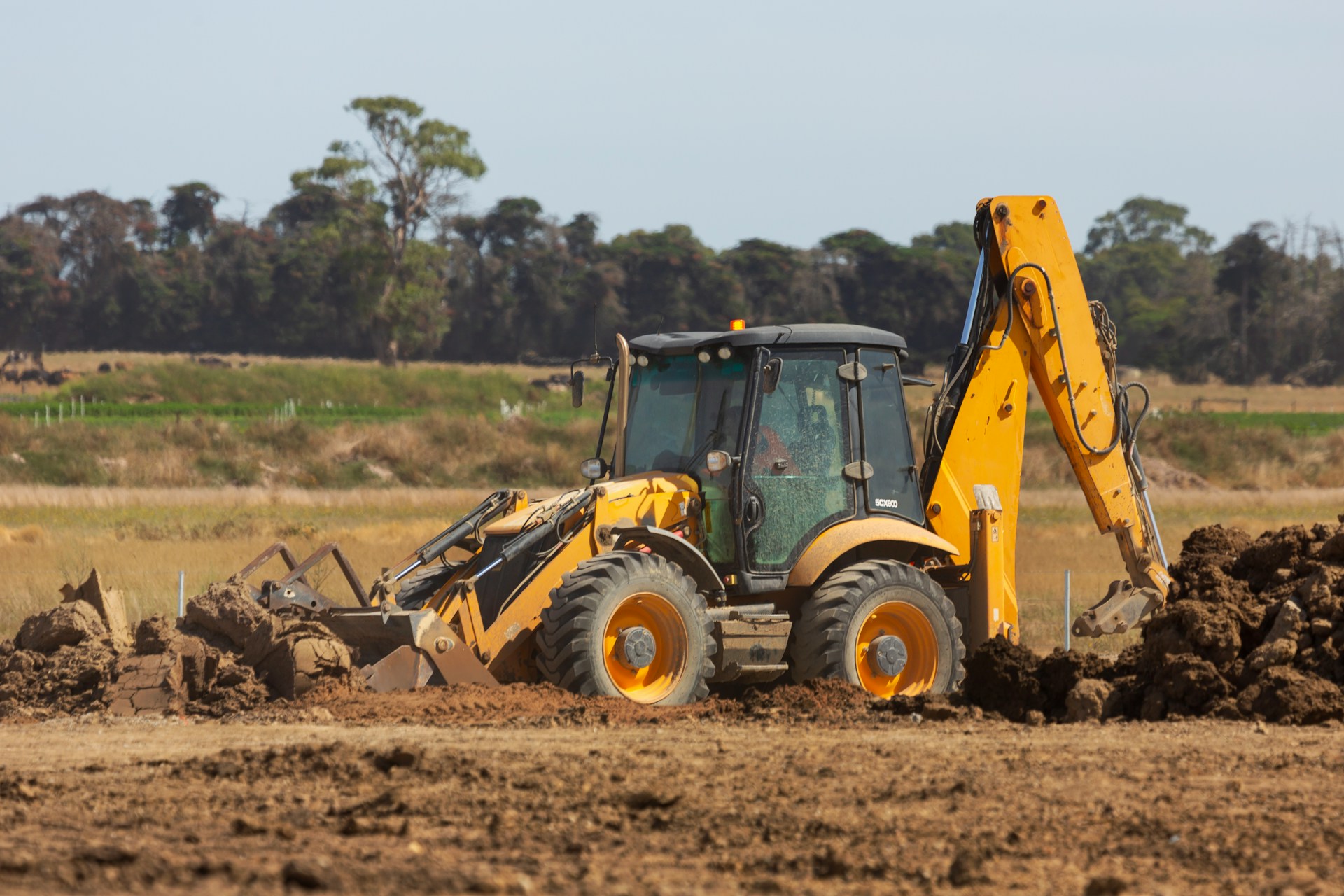 Mini excavator in residential estate construction
